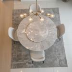 ميرانو طاولة طعام رخام صناعي بدون كراسي وودي